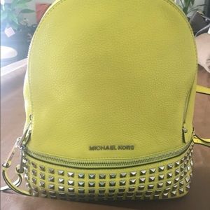 Michael Kors yellow backpack